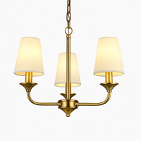 Golden chandelier with royal fabric shades