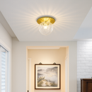 Round gold LED ceiling light with glass globe porch