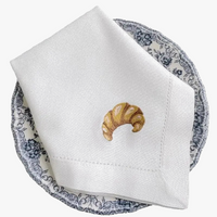 Embroidered linen napkin with croissant motif, customisable