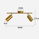Modern rounded LED spotlight in gold metal