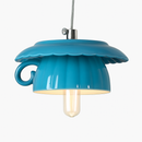 Modern LED pendant light in the shape of a tipped coffee cup