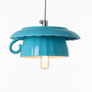 Modern LED pendant light in the shape of a tipped coffee cup