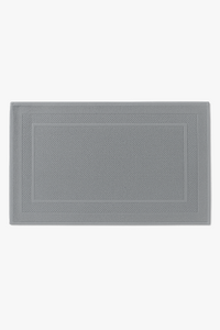 Absorbent cotton bath mat with modern cartoon style