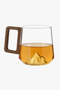 Minimalist borosilicate glass tea cup with wooden handle