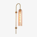 Designer LED wall light with elongated shade in colored glass and metal