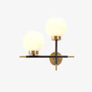 Modern gold LED wall light with glass globe