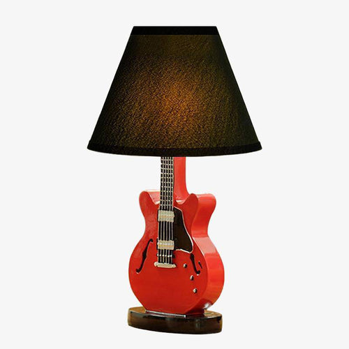 Guitar table lamp with decorative shade