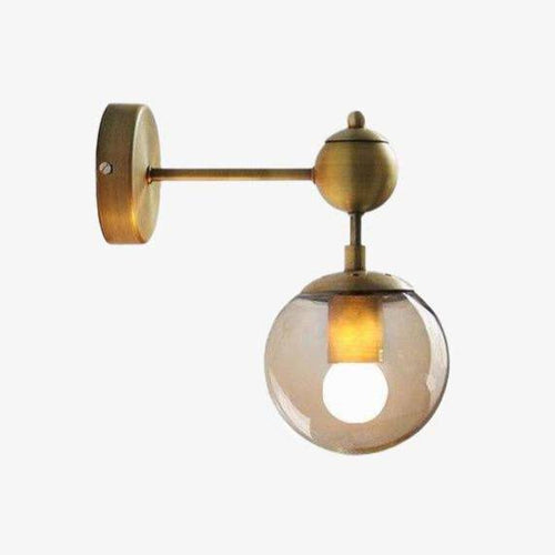 Retro gold wall light with glass globe style