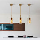 Pendant light with cylindrical glass shade raven