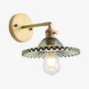 Gold wall light with coloured glass shade