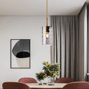 Pendant light with cylindrical glass shade raven