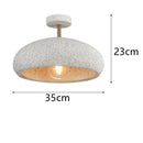 Modern ceiling light with stone-effect shade kery
