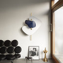 White designer wall light with gold stem crissy