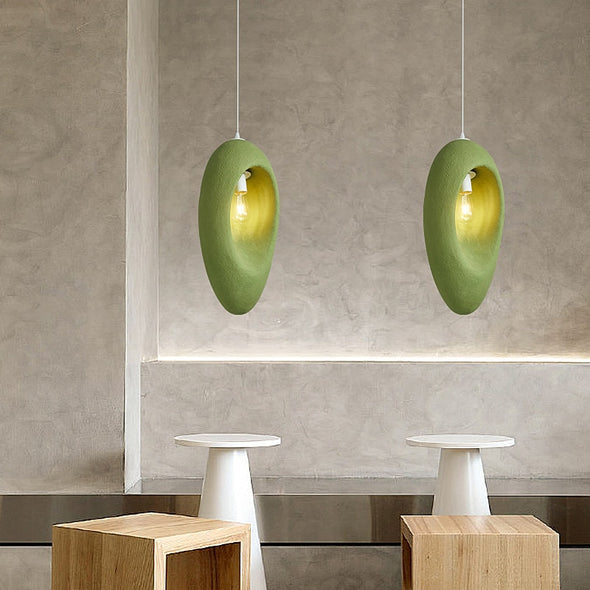 Designer pendant light with carved shade joannes