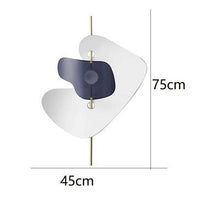 White designer wall light with gold stem crissy