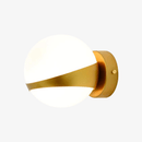 Gold wall light with globe