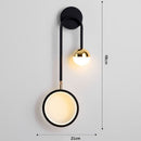 Geometric design wall light with hanging globe Oryna