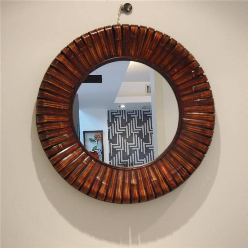 Round decorative wall mirror in bamboo wood