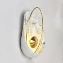 Led designer marble wall light with gold ring