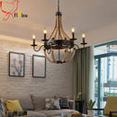 Rustic chandelier in metal and ropes with burning lamps