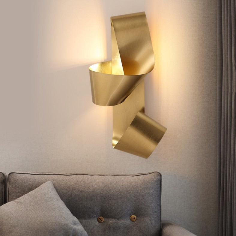 Gold LED design wall light in the shape of a Bowie knot