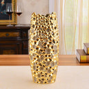 Festival long design vase in golden ceramic