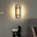 Industrial LED wall sconce with metal and glass tube