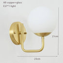 Gold LED designer wall light with glass globe luxury
