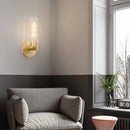 Gold wall light with copper glass cylinder