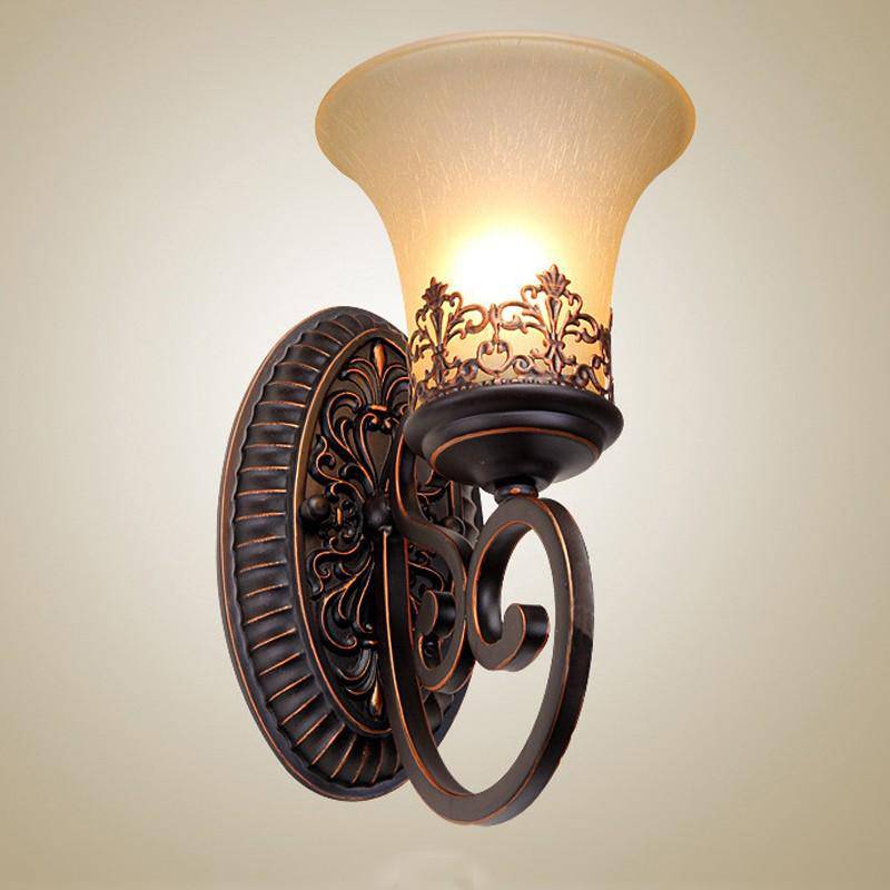 Rustic retro metal wall light with glass shade