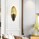 Oval shell designer wall light with gold cylindrical lamps