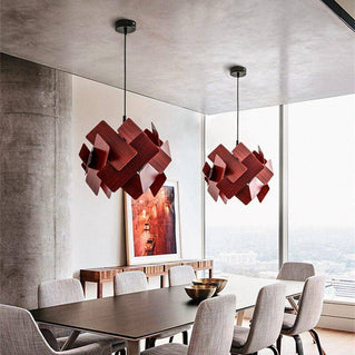 Designer pendant light with multiple coloured panels stack