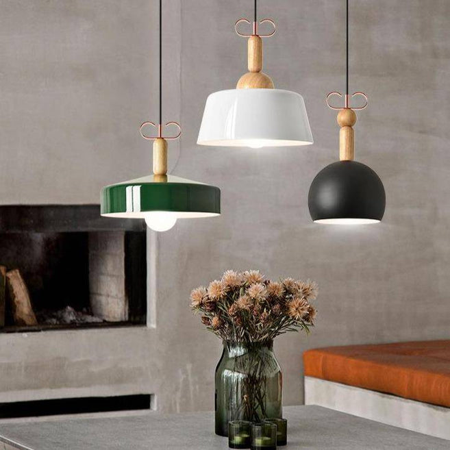 Modern pendant light with coloured shade and wooden rod
