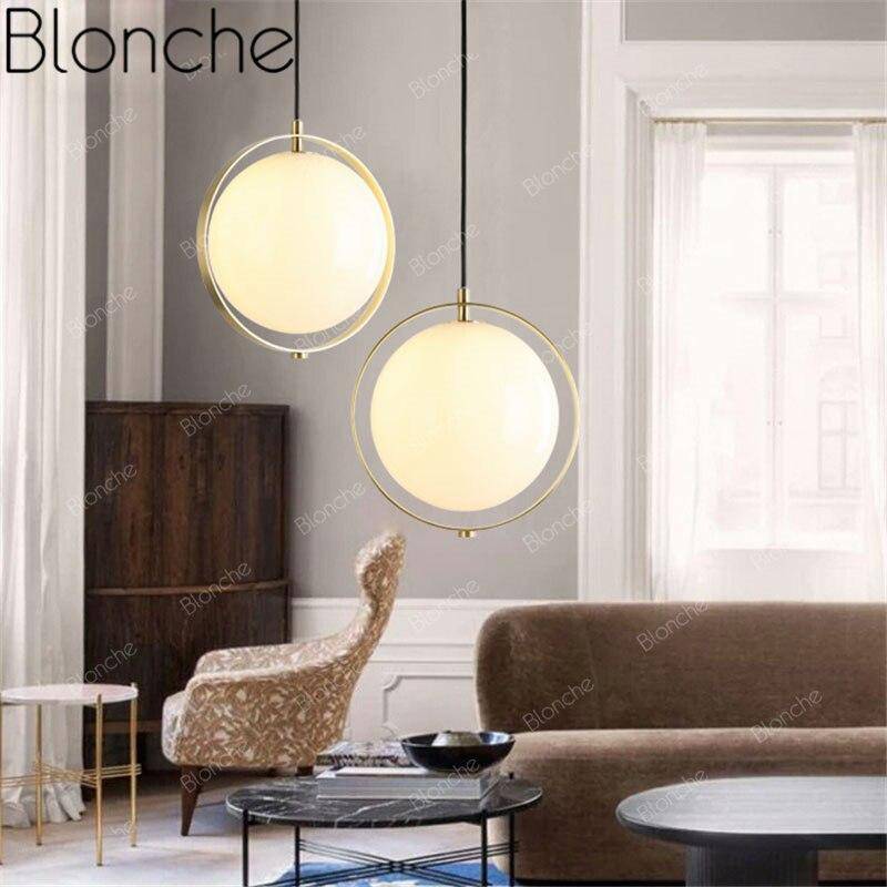 Designer LED pendant light with gold ring and glass globe