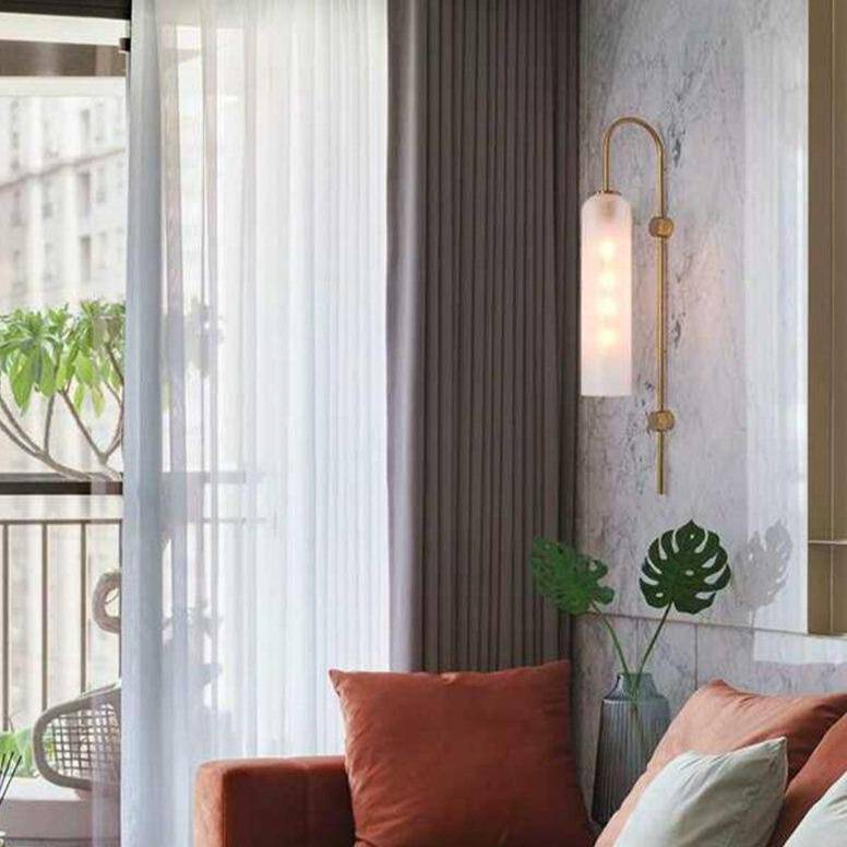 Designer LED wall light with elongated shade in colored glass and metal