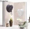 Design LED wall light with gorilla head in resin