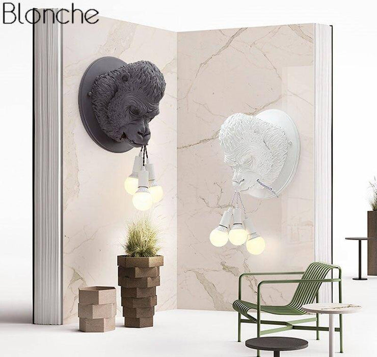 Design LED wall light with gorilla head in resin