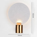 Designer LED wall light in metal with glass disc Sconce