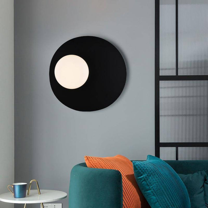 Designer LED wall light with black metal disc loft style