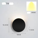 Design LED wall light with curved metal tile