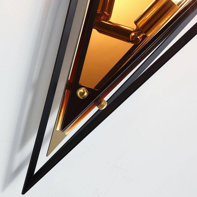 Designer LED wall light in triangular glass