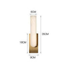 Modern elongated LED wall light with rounded marble shade