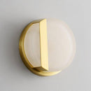 Curved gold metal and marble LED wall light