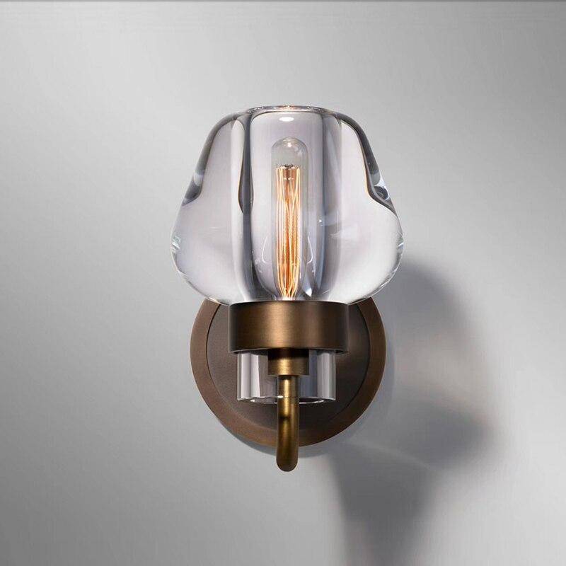 Modern copper wall light with sculpted shade luxury