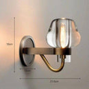 Modern copper wall light with sculpted shade luxury