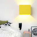 Modern LED wall light in colourful metal cube