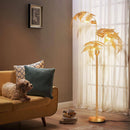 Designer LED pendant light with palm tree effect metal
