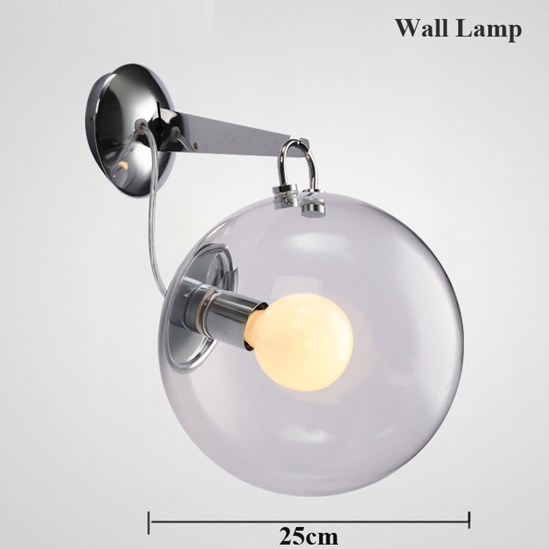 Silver industrial wall light with glass globe Irantzu