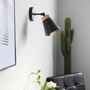 Modern wall light with coloured conical shade eddy