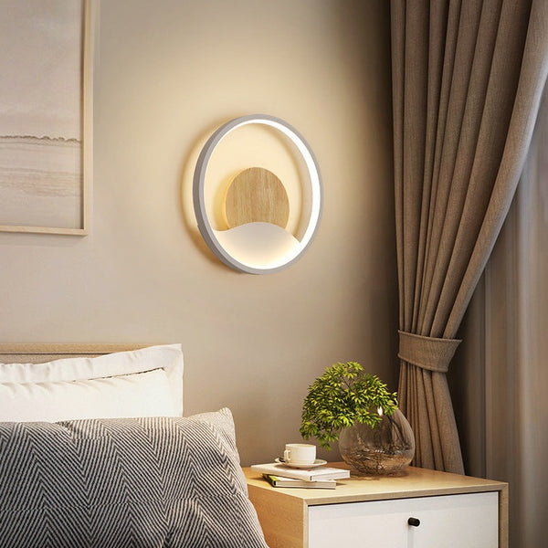 Round LED designer wall light with luminous ring globe